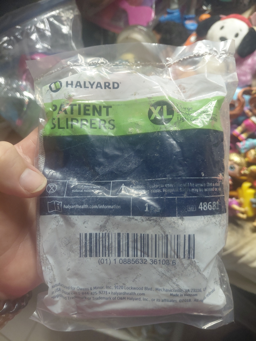 sealed package of Halyard Patient Slippers XL double tread light grey- cotton